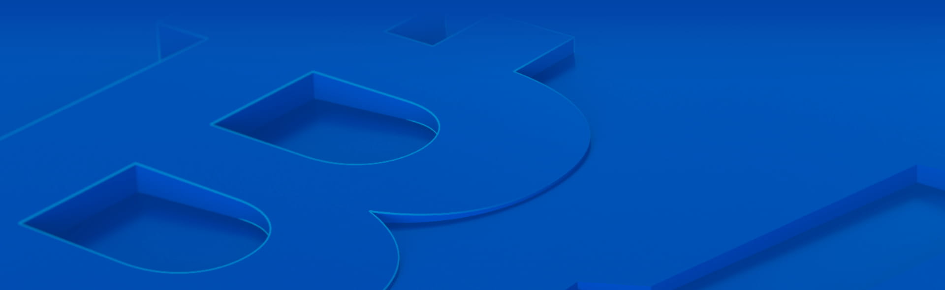 Embossed Bitcoin currency symbol on blue background as used on FOREX currency page